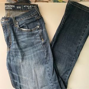 Classic distressed blue denim jeans